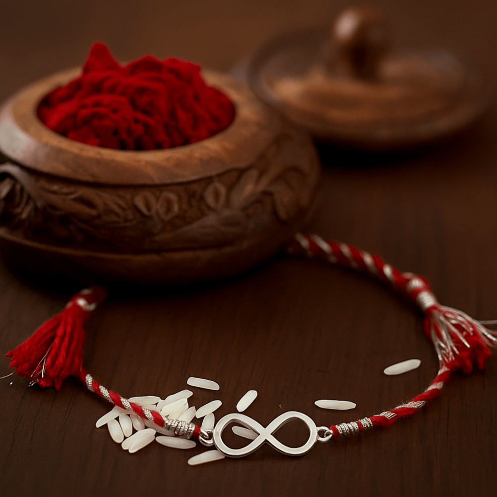 92.5 Sterling Silver Infinity Loomba Rakhi for Bhabhi in Red Thread - Bangles And Bracelets