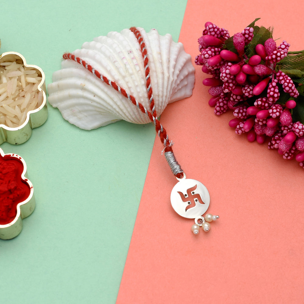 92.5 Sterling Silver Swastik Loomba Rakhi for Bhabhi in Red Thread