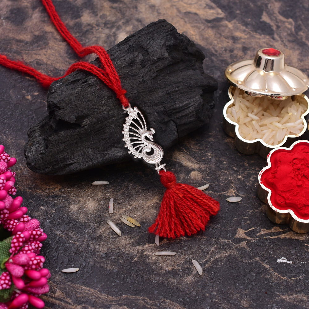 Silver Alloy Peacock Thread Loomba Rakhi for Bhabhi